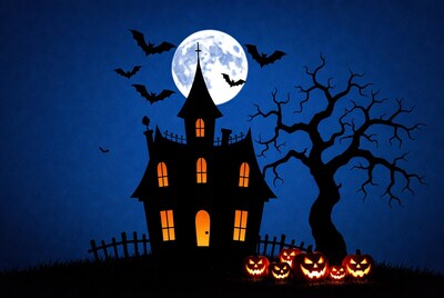 Haunted house with bats and pumpkins