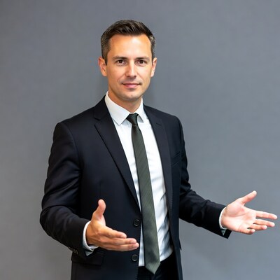 Man in suit with open hands