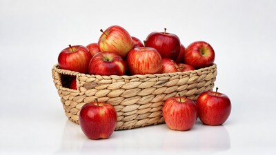 Red apples in wicker basket