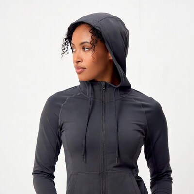 African-American woman in gray hoodie