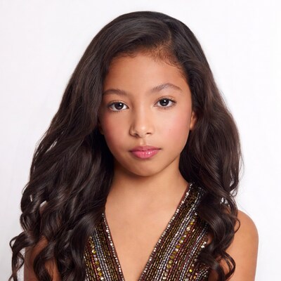 Young girl with long curly hair