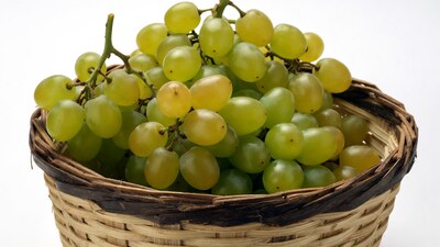Green grapes in wicker basket