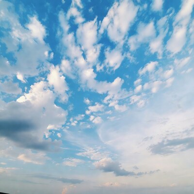 Fluffy Clouds in Blue Sky