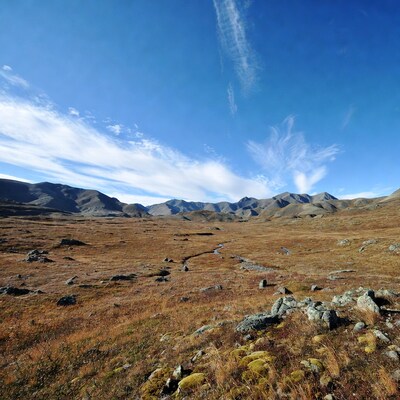 Autumn Valley with Mountains and Stream