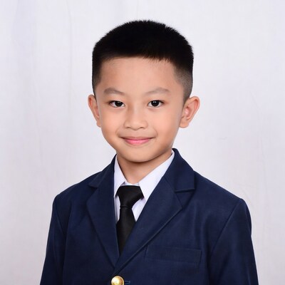 Asian boy in navy school uniform