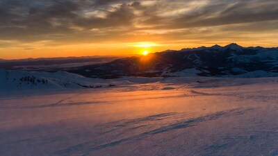 Sunset over snowy mountains