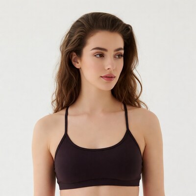 Woman in black sports bra profile