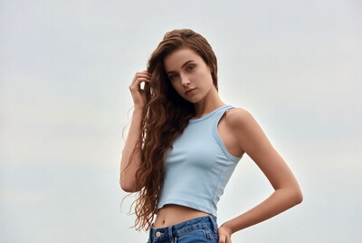 Woman with wavy hair in tank top