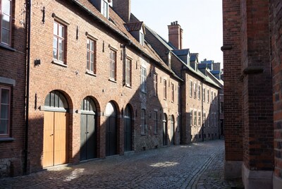Historic Brick Houses on Cobblestone Alley
