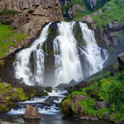 Majestic Waterfall Cascading Over Rocks