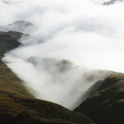 Clouds filling mountain valley