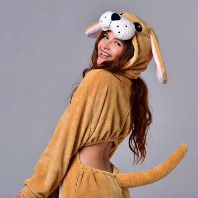 Girl in yellow dog onesie costume
