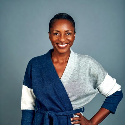 Smiling African-American woman in blue cardigan