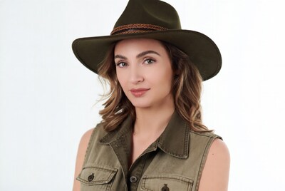 Woman wearing green fedora hat