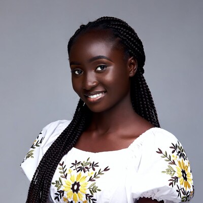 Smiling African woman with braids