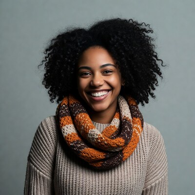 Smiling African-American woman in knitted scarf