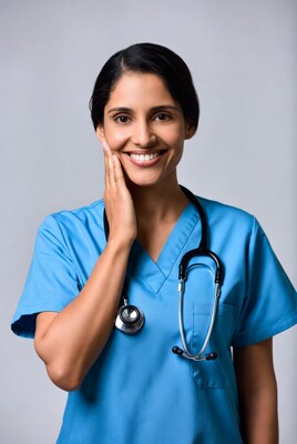 Smiling nurse in blue scrubs