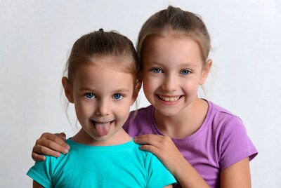 Two girls smiling together