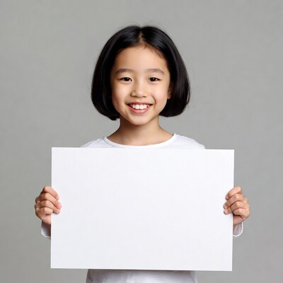 Asian girl holding blank sign