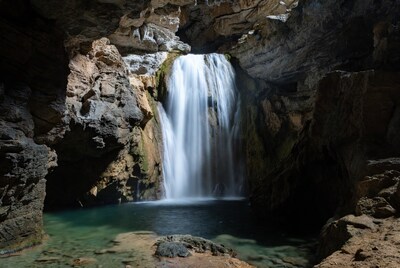 Waterfall in rocky cave