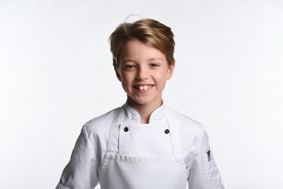 Young boy in chef uniform