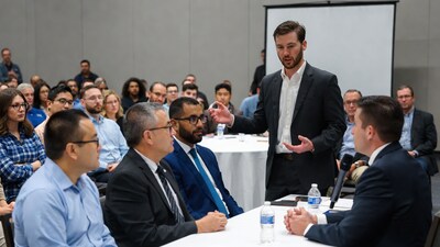 Businessman speaking at conference table