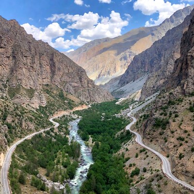 Winding road through mountain valley