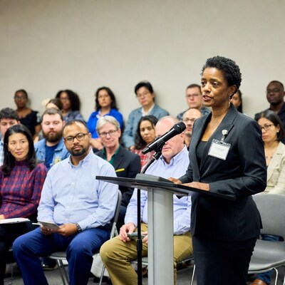 Woman speaking at podium