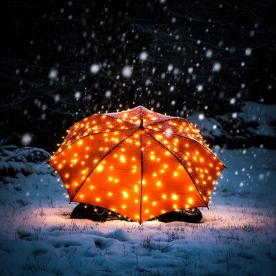 Glowing Umbrella in Snow
