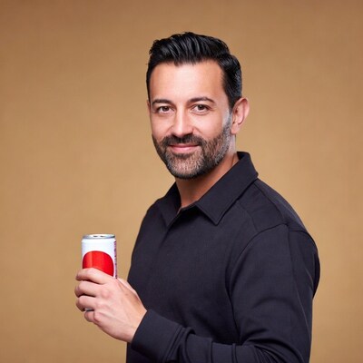 Man holding soda can