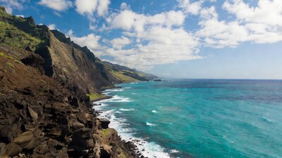 Coastal cliffs overlooking turquoise ocean