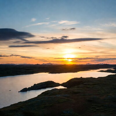 Sunset over mountain lake
