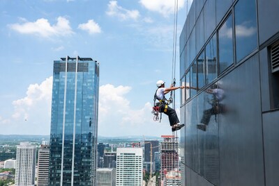 Window cleaner on skyscraper