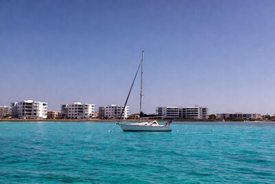 Sailboat on turquoise water