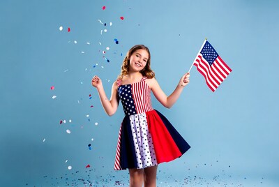 Girl holding American flag
