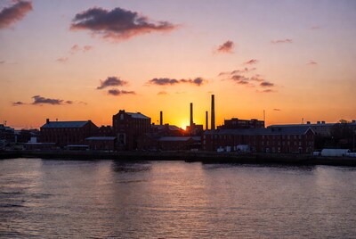 Industrial buildings at sunset