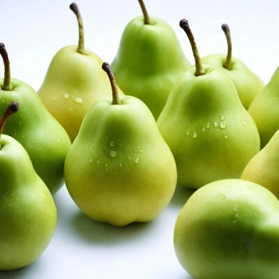 Fresh green pears with water drops