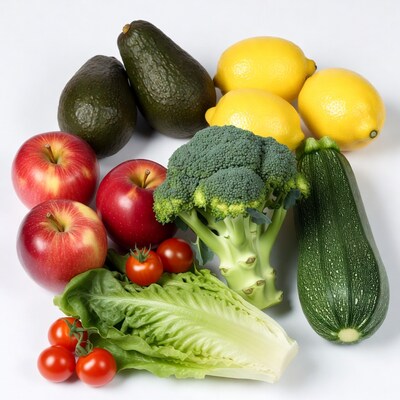Fresh fruits and vegetables on white