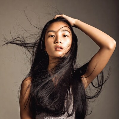 Asian woman with flowing black hair