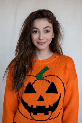 Woman in pumpkin sweater