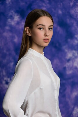 Young woman in white blouse