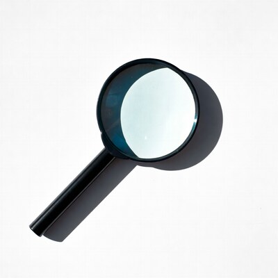 Magnifying glass on white background