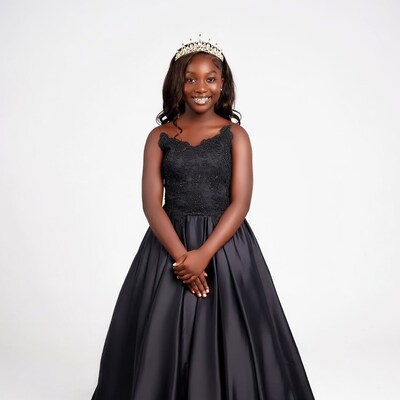 Young girl in black ball gown