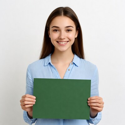 Young woman holding green sign