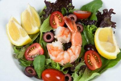 Shrimp salad with lemon and olives