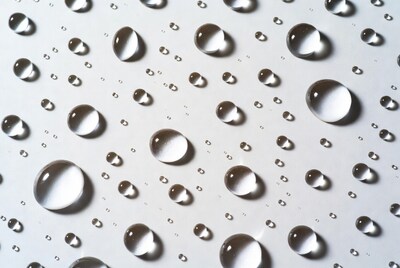 Water droplets on white surface