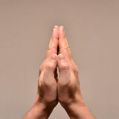 Hands in prayer position