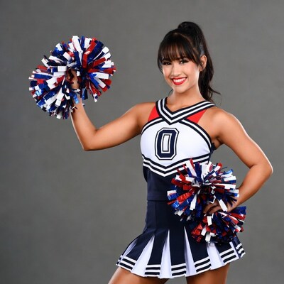 Cheerleader holding pom poms