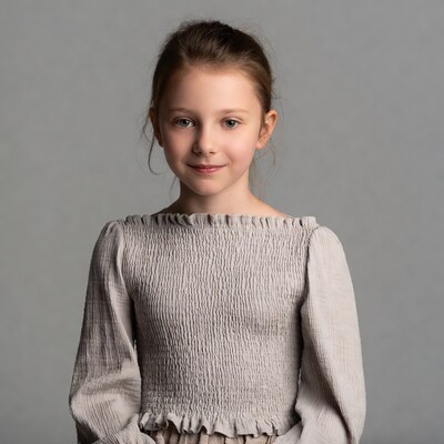 Young girl in beige blouse