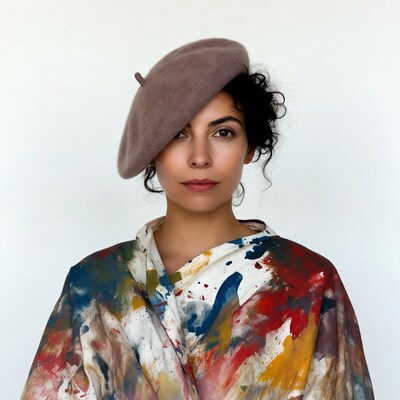 Woman in beret with paint splatters